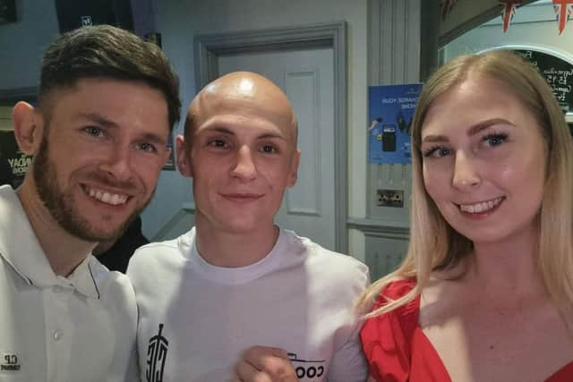 Connor Edney, centre, was cheered on by cousin Molly Mcmeekin, right, and her boyfriend Matt Morgan on his South Parade Pier professional return