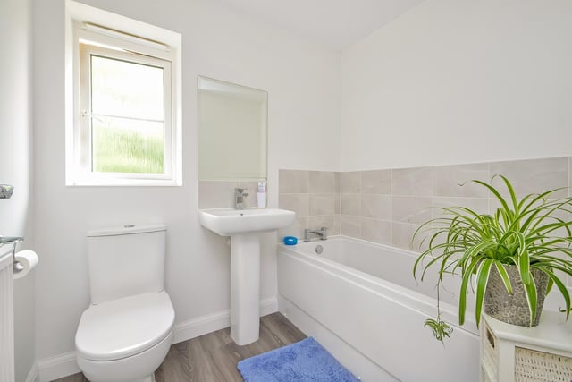 This three bedroom property is on the market at a guide price of £415,000. It is listed by Town and Country.