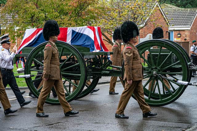 A Union flag draped over a coffin on the back of a gun carriage as Royal Navy personnel take part in rehearsals for Queen Elizabeth II's funeral at HMS Collingwood Picture: Ben Birchall/PA Wire