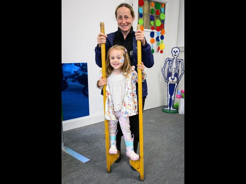 Pictured is: Willow, 6 tries out the stilts at the circus workshop with Mum Lara.
Picture: Keith Woodland (170721-15)