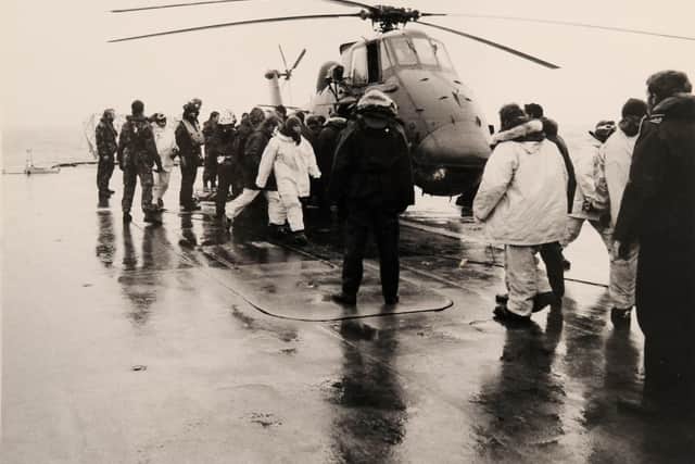 The picture shows a helicopter returning to HMS Antrim having rescued SAS Troopers trapped on a glacier. Then-Lieutenant Chris Parry was mentioned in despatches for his role in the re-taking of South Georgia 
Picture: (120547-758)