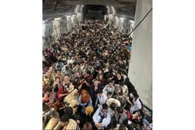 A picture released by the US Air Force shows the inside of Reach 871, a U.S. Air Force C-17 Globemaster III flown from Kabul to Qatar with 640 Afghans on board 
Picture: Capt. Chris Herbert / US Airforce / AFP via Getty Images)