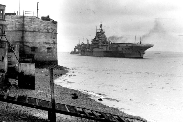 HMS Indomitable goes past the Round Tower in 1953. The News PP690