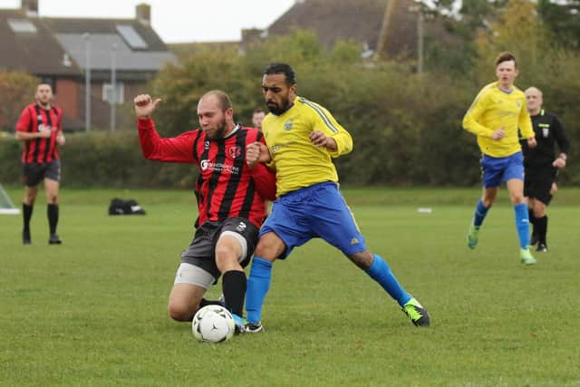 Action from Meon Milton's 5-2 Mid-Solent League win over Rowner (red). Picture by Kevin Shipp