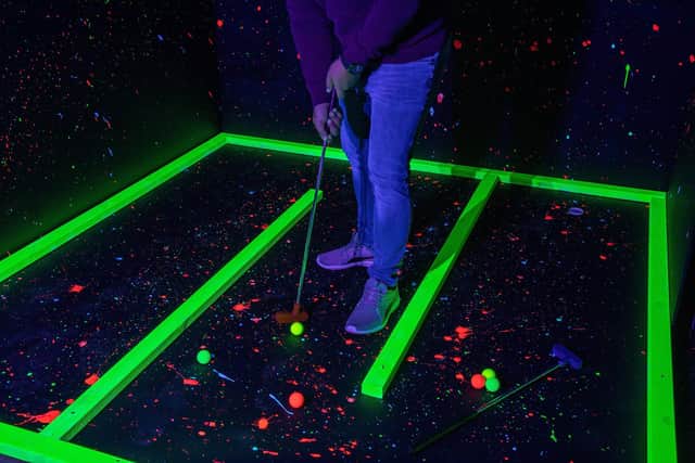 Visitors to Zingers UV Golf can play on courses which come alive under UV lights. Picture: Mike Cooter (230821)