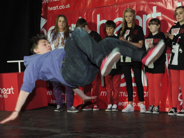 Portsmouth Commercial Road Christmas lights switch on in 2012. Pictured is Shane Browne 14 of Southzone dance academy in mid air Picture: Paul Jacobs (123834-5)