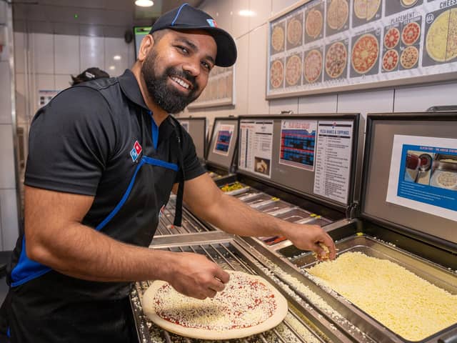 Alok Yadav learnt English from reading the Domino's menu and after working at the store in Portsmouth as a cleaner, he is now a franchise partner