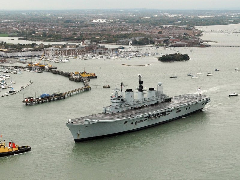 HMS Ark Royal leaves Portsmouth Harbour for what may be her last time in active service 9th November 2010. Picture: Malcolm Wells 0000-0175