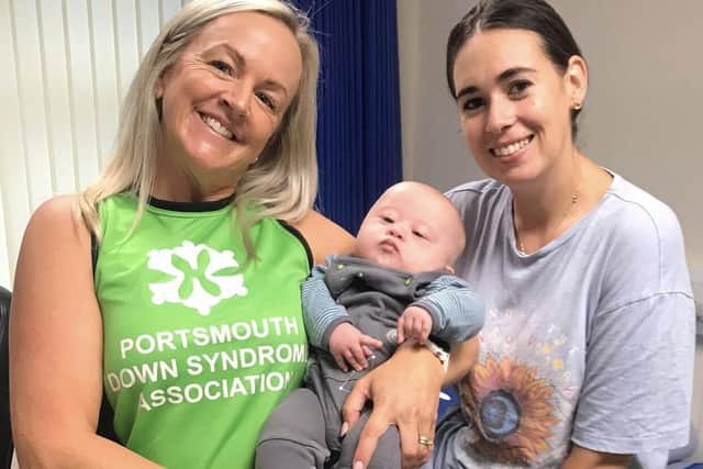 Some of the people taking part in the Great South Run for the Portsmouth Down Syndrome Association. 
Left to right: Natasha, Reign and Kirsty.