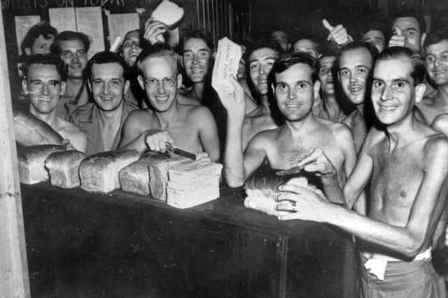 1945: Prisoners of War from the Allied forces eating after being liberated from a Japanese camp in Taiwan (Formosa). Picture: Keystone/Getty Images