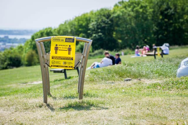 Police are hunting a group of 14 yobs who attacked a pair of men on Portsdown Hill. Pictured is a shot of people relaxing on the hill on May 27.
Picture: Habibur Rahman