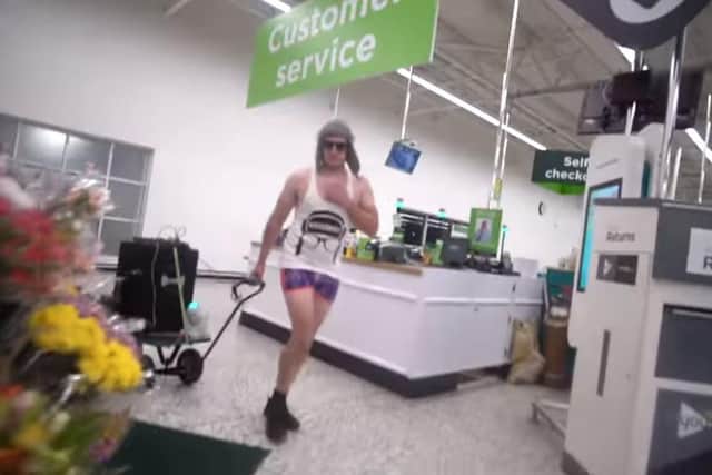 YouTube prankster Lee Marshall, 34, who goes by the name DiscoBoy on the streaming site has been convicted of assault by beating against an Asda supermarket night manager. 

Pictured:  Lee Marshall wearing shorts, a vest and a hat inside the Asda store