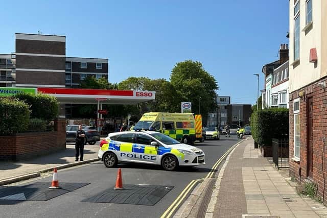 Police and ambulance by the Esso petrol station in Green Road, Somers Town