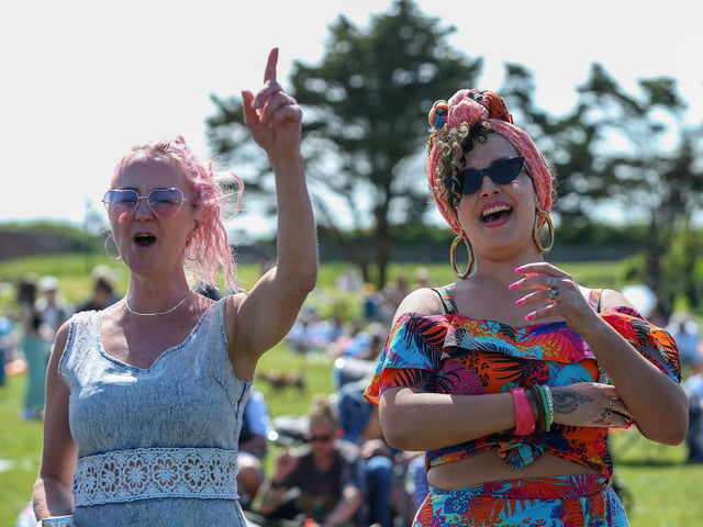 Gee Louise annd Hannah Reem (right) sing along to The Mighty Allstars at Live at the Bandstand.Picture: Chris Moorhouse (250524-56)