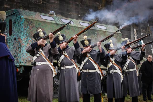 The Fort Cumberland Guard fired a musket volley during the ceremony. Picture: Paul Collins.