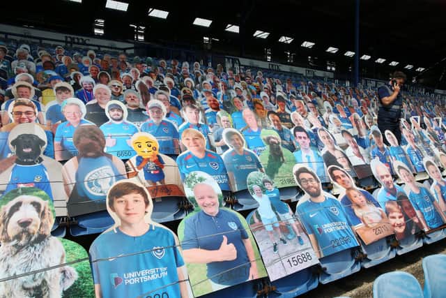 Cardboard cutouts of fans in the stand for the play-off game against Oxford