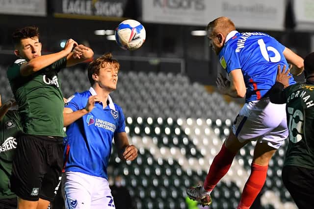 Jack Whatmough's header was blocked by the arm of Plymouth's Kelland Watts to win Pompey a penalty. Picture: Dan Mullan/Getty Images