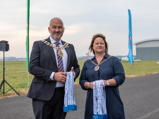 Councillor Fred Birkett (Mayor of Fareham) and Lisa Birkett (Mayoress of Fareham) ready to present medals to the runners. 
Picture: Mike Cooter