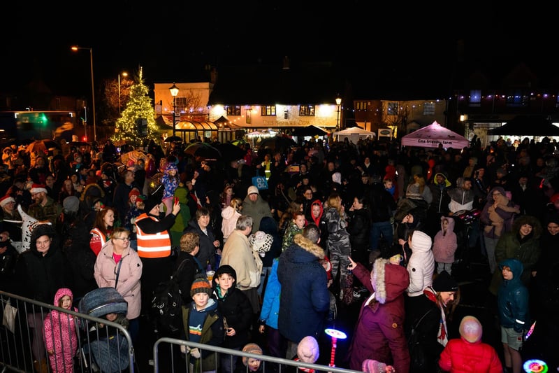 A good crowd gathered in the square to the see the Wickham Christmas lights switch on