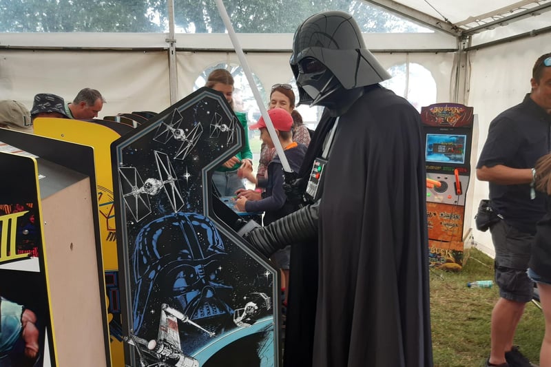 Darth Vader makes an appearance - and plays Star Wars game in the retro gaming tent