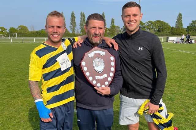 From left - Gary Jeffery, Kev Doughty (manager) and Charlie Moore with the Hampshire Combination East Division silverware after Paulsgrove's 2-1 win at Hayling United.