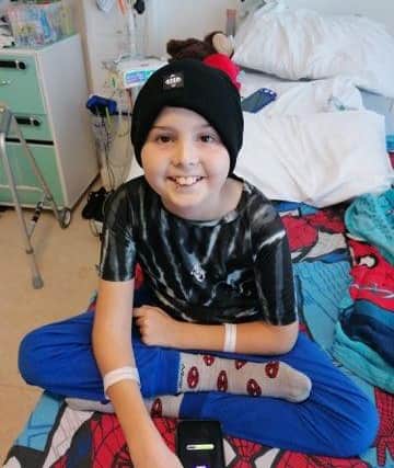 The Grant family.
Pictured: Liam Grant in hospital during his treatment