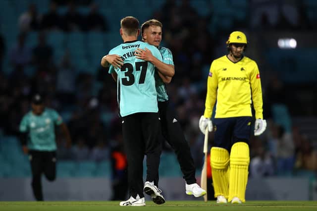 Sam Curran celebrates after taking his fifth wicket against Hampshire tonight. Photo by Ben Hoskins/Getty Images for Surrey CCC.