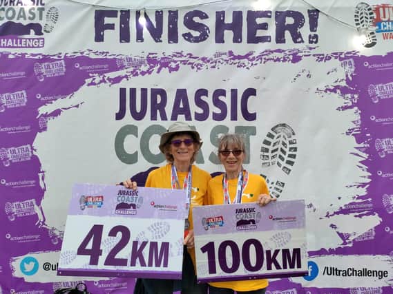 Sisters Kate Drew, 64, left, and Jill Turner, 71, from Bridport have raised £2,305 for children’s hospice Chestnut Tree House by walking 100km and 42km along the Jurassic Coast