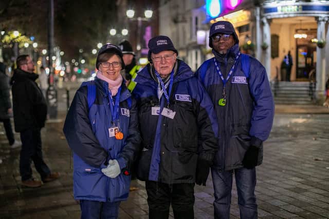 Pictured: Street Pators Karen, Barrie and Peter supporting police and paramedics during a Saturday night in the Guildhall area.
Picture: Habibur Rahman