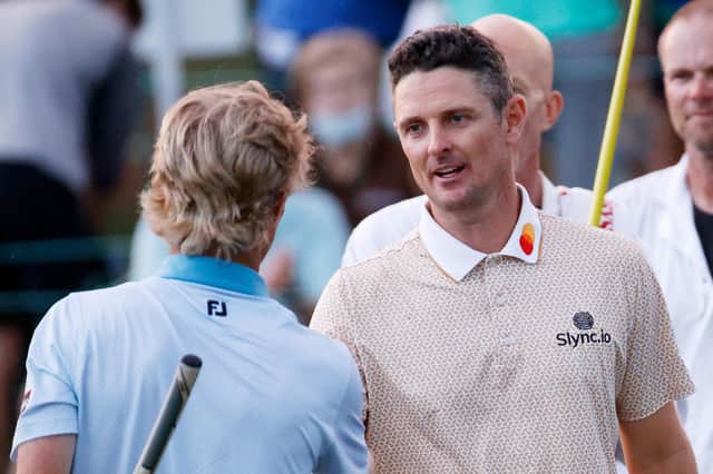 Justin Rose shakes hands with playing partner Will Zalatoris following a score of 72 on day three at the Masters. Picture: Jared C. Tilton/Getty Images