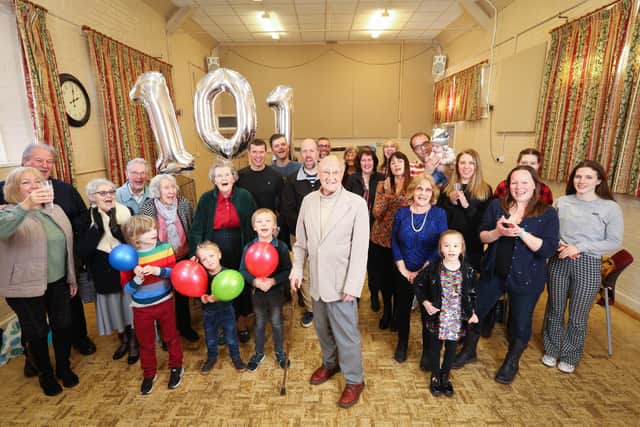 Boris, centre, with family and friends. Boris Mayfield's 101st Birthday, Denmead Community CentrePicture: Chris Moorhouse (jpns 120322-71)