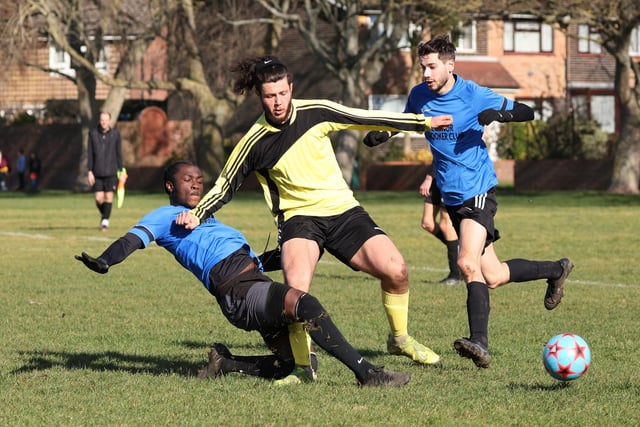 Hatton (yellow) v AFC Eastney. Picture by Kevin Shipp