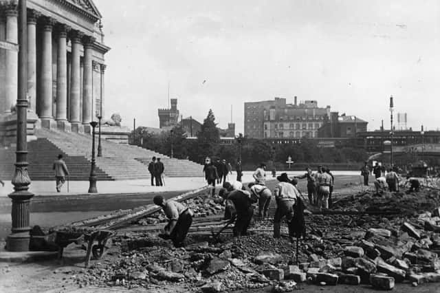 1902:  The laying of the electric track for Portsmouth trams, outside the town hall (later the Guildhall).  Picture: Hulton Archive/Getty Images.