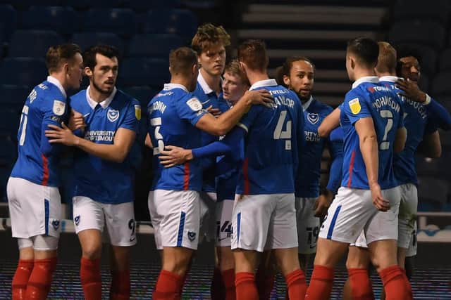 Pompey celebrate Sean Raggett's goal against Oxford. Picture:  Mike Hewitt/Getty Images