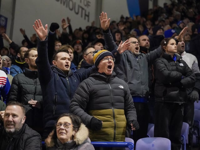 Pompey fans backed their team to a crucial Championship survival win over Cardiff last night.