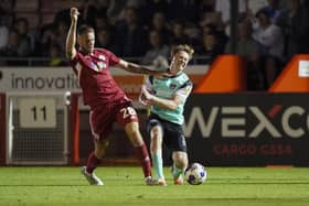 Denver Hume feels the pain following a challenge Teddy Jenks in Pompey's Papa John's Trophy encounter at Crawley. Picture: Jason Brown/ProSportsImages