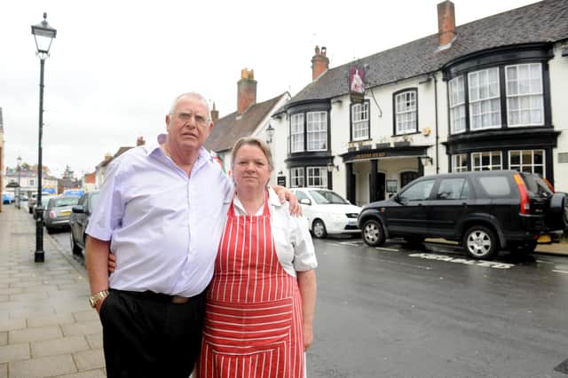 Bob and his wife Maz Forster, who have now retired after more than a decade at the helm of The Queens Head in Titchfield 
Picture: Sarah Standing (151805-7931)