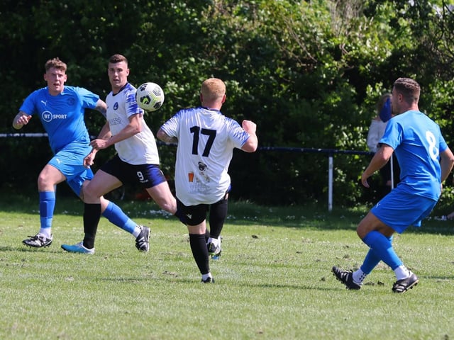 Paulsgrove (blue) v Clanfield. Picture: Sam Stephenson.