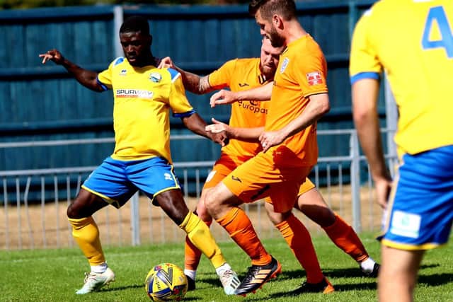 Abdulai Baggie, left, on his superb debut against Merthyr. Picture by Tom Phillips