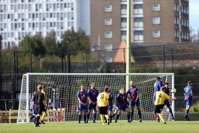 US Portsmouth defend a free-kick during their 5-1 win over Downton. Picture: Chris Moorhouse