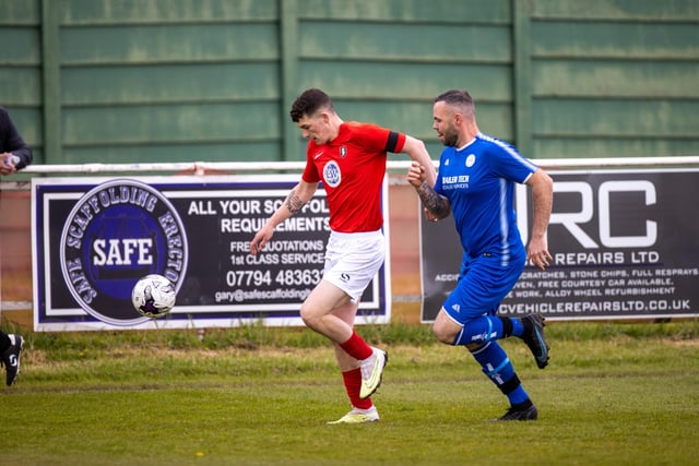 Action from Gosport Town's 4-0 victory over Lee Rangers (blue kit) in the Portsmouth & District FA Trophy final at Cams Alders. Picture: Alex Shute