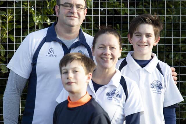 The Higgins family sporting their club t shirts for the challenge