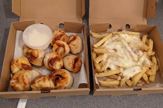 Pepperoni dough balls with garlic dip and a side of cheesy chips from Arty's.