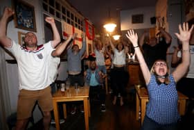 England fans pictured at the Artillery Arms in Portsmouth, UK, watching England play on TV in the Semi-finals at Wembley.Pictured are fans enjoying the night.Picture: Sam Stephenson