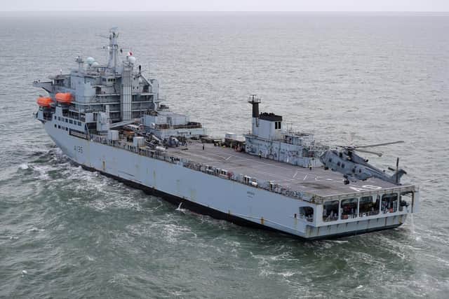 A Merlin helicopter from 845 Naval Air Squadron recovering to the flight deck of RFA Argus off the coast of Honduras. Picture: LPhot Robert Oates