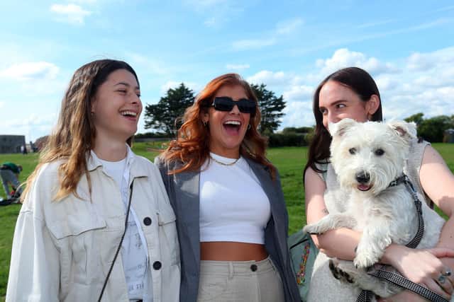 From left, Sidnie Brennan, Ellisia Cartwright and Ellie Rowe with Bear. Picture: Chris Moorhouse (jpns 240922-13)