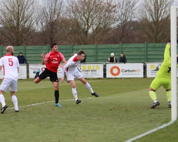 Jack Breed heads in his second goal, and Fareham's fourth. Picture by Ken Walker