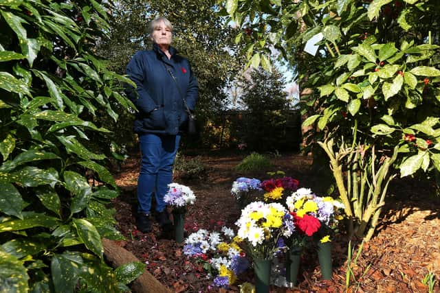 Karen James objects to the way in which memorials are cleared away so quickly by staff at Portchester Crematorium Picture: Chris Moorhouse