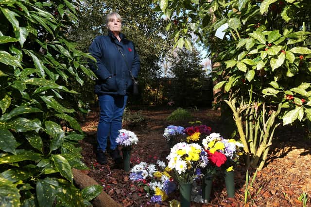 Karen James objects to the way in which memorials are cleared away so quickly by staff at Portchester Crematorium Picture: Chris Moorhouse