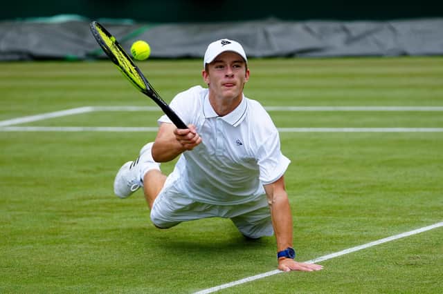 Louis Bowden in action against Robin Bertrand at Wimbledon. Photo by Mike Hewitt/Getty Images.